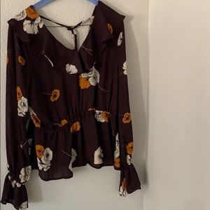 Flowery blouse with low back